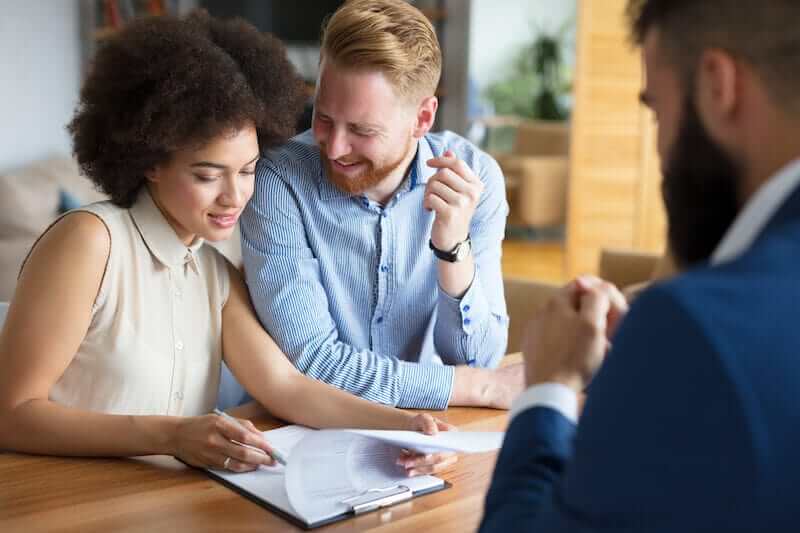 happy couple considering working with cash homebuyer