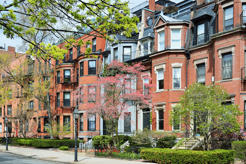Frontal view of a group of houses in a Queens neighborhood